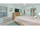 Bright bedroom with ocean views and ensuite bath at 7536 Palm Island S Dr # 1511, Placida, FL 33946