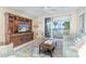 Beachfront living room with ocean view and comfortable furnishings at 7536 Palm Island S Dr # 1511, Placida, FL 33946