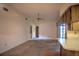 Living room with carpeted floor and ceiling fan at 948 Andrews Nw Ave, Port Charlotte, FL 33948