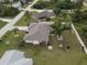 Single-Gathering home with a large backyard and a long driveway at 948 Andrews Nw Ave, Port Charlotte, FL 33948