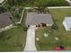 Single-Gathering home with a large backyard and a long driveway at 948 Andrews Nw Ave, Port Charlotte, FL 33948