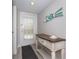 Bright entryway with console table and coastal-themed decor at 7454 Palm Island Dr # 3313, Placida, FL 33946
