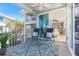 Screened porch with view of the ocean and living room at 7454 Palm Island Dr # 3313, Placida, FL 33946