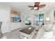 Living area features a TV, comfy seating, and access to a bedroom at 7454 Palm Island Dr # 3313, Placida, FL 33946