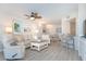 Spacious living room with comfortable seating and coastal decor at 7454 Palm Island Dr # 3313, Placida, FL 33946