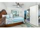Bright bedroom with a large bed, ocean view, and private balcony at 7454 Palm Island Dr # 3313, Placida, FL 33946