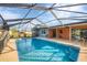 Inviting screened pool with ample deck space at 3081 Pellam Blvd, Port Charlotte, FL 33948