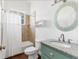 Cozy bathroom featuring a shower-tub combo, granite countertops, and neutral color palette at 342 Green Dolphin Dr, Placida, FL 33946