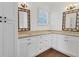 Elegant bathroom featuring dual sinks, granite countertops, custom cabinets, and modern fixtures at 342 Green Dolphin Dr, Placida, FL 33946