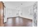 Bright, spacious bedroom with wood-look tile floors, natural light, and modern white trim at 342 Green Dolphin Dr, Placida, FL 33946