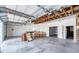 Spacious garage featuring exposed ceilings and an open area that leads to the interior at 342 Green Dolphin Dr, Placida, FL 33946