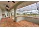 Covered lanai with terracotta tile flooring and backyard views at 342 Green Dolphin Dr, Placida, FL 33946