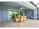 Covered patio with outdoor dining set and pool view at 8099 Walbert St, Port Charlotte, FL 33981