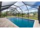 Relaxing screened pool with a view of the canal at 8099 Walbert St, Port Charlotte, FL 33981