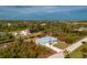 Single-story house with metal roof and a canal nearby at 8099 Walbert St, Port Charlotte, FL 33981
