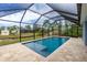Enjoy this refreshing screened pool with canal view at 8099 Walbert St, Port Charlotte, FL 33981