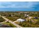 Single-story house with metal roof and a canal nearby at 8099 Walbert St, Port Charlotte, FL 33981