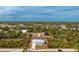 Single-story house with metal roof and a canal nearby at 8099 Walbert St, Port Charlotte, FL 33981