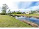 Serene canal view adjacent to the property at 8099 Walbert St, Port Charlotte, FL 33981