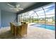 Screened patio overlooking the pool and backyard at 8099 Walbert St, Port Charlotte, FL 33981
