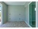 Covered patio with sliding glass doors and tile flooring at 9293 Panama Cir, Port Charlotte, FL 33981
