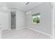 Light and airy dining room with large window and hardwood floors at 9293 Panama Cir, Port Charlotte, FL 33981