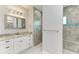 Elegant bathroom with granite vanity, tiled shower, and modern fixtures at 9293 Panama Cir, Port Charlotte, FL 33981