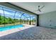 Screened pool and patio area, perfect for relaxation at 9293 Panama Cir, Port Charlotte, FL 33981