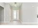 Bright and airy entryway with hardwood floors at 9293 Panama Cir, Port Charlotte, FL 33981
