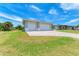 Two-car garage and side yard at 9293 Panama Cir, Port Charlotte, FL 33981