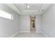 Bright bedroom with ceiling fan and access to en-suite bathroom at 9293 Panama Cir, Port Charlotte, FL 33981