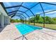 Inviting screened pool with ample space for lounging at 9293 Panama Cir, Port Charlotte, FL 33981