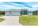 Two-car garage and well-maintained front yard at 9293 Panama Cir, Port Charlotte, FL 33981