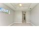 Bedroom with ceiling fan and access to bathroom at 14999 Wichita Rd, Port Charlotte, FL 33981