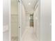 Walk-in closet and bathroom with double sinks at 14999 Wichita Rd, Port Charlotte, FL 33981
