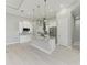 Open kitchen with island and stainless steel appliances at 14999 Wichita Rd, Port Charlotte, FL 33981