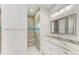 Spa-like bathroom with a walk-in shower and bench at 14999 Wichita Rd, Port Charlotte, FL 33981