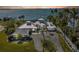 Waterfront property aerial view. Large home with circular driveway at 12440 Placida Rd, Placida, FL 33946