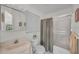 Bathroom with shower/tub combo, sink, and vanity at 12440 Placida Rd, Placida, FL 33946
