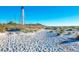 Scenic beach path with lighthouse view at 12440 Placida Rd, Placida, FL 33946