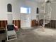 An entryway with a spiral staircase, currently under renovation at 12440 Placida Rd, Placida, FL 33946