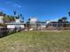 House exterior with a large lawn and pool at 12440 Placida Rd, Placida, FL 33946