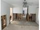 Living room with exposed framing during renovations at 12440 Placida Rd, Placida, FL 33946