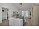 Living room with light teal couch and built-in shelving at 12440 Placida Rd, Placida, FL 33946