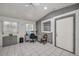 Home office with built-in desk and exterior access at 12440 Placida Rd, Placida, FL 33946
