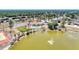 Community pool, tennis courts, and clubhouse near a lake at 13525 Dibella Ave, Port Charlotte, FL 33981