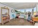 Enclosed Florida room with ample space for relaxing and storage at 13525 Dibella Ave, Port Charlotte, FL 33981