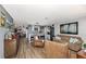 Open-concept living area features a cozy seating arrangement and seamless flow into the kitchen at 13525 Dibella Ave, Port Charlotte, FL 33981