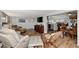Spacious living room with open floor plan, seamlessly connecting to the dining area and kitchen at 13525 Dibella Ave, Port Charlotte, FL 33981