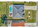 Aerial view of a home showcasing its roofline and pool area at 2341 Rio De Janeiro Ave, Punta Gorda, FL 33983